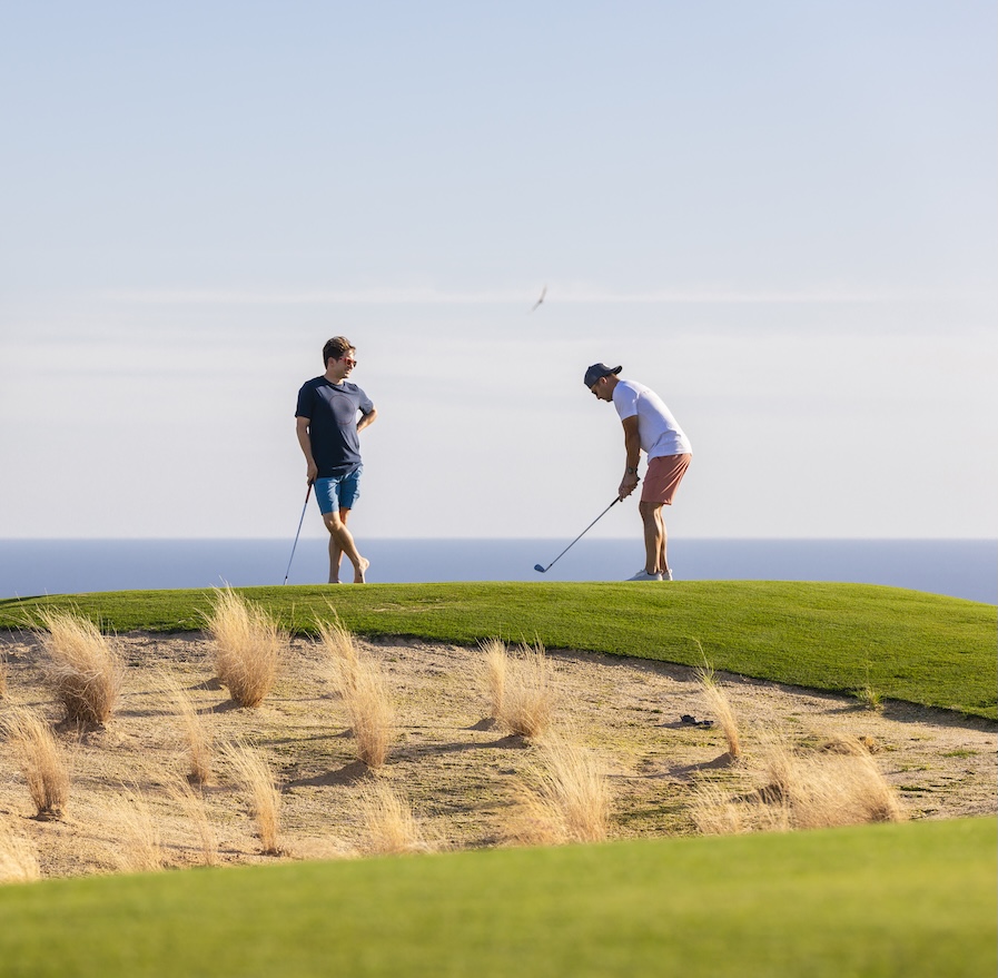 two people golfing on the backyard short course at maravilla los cabos